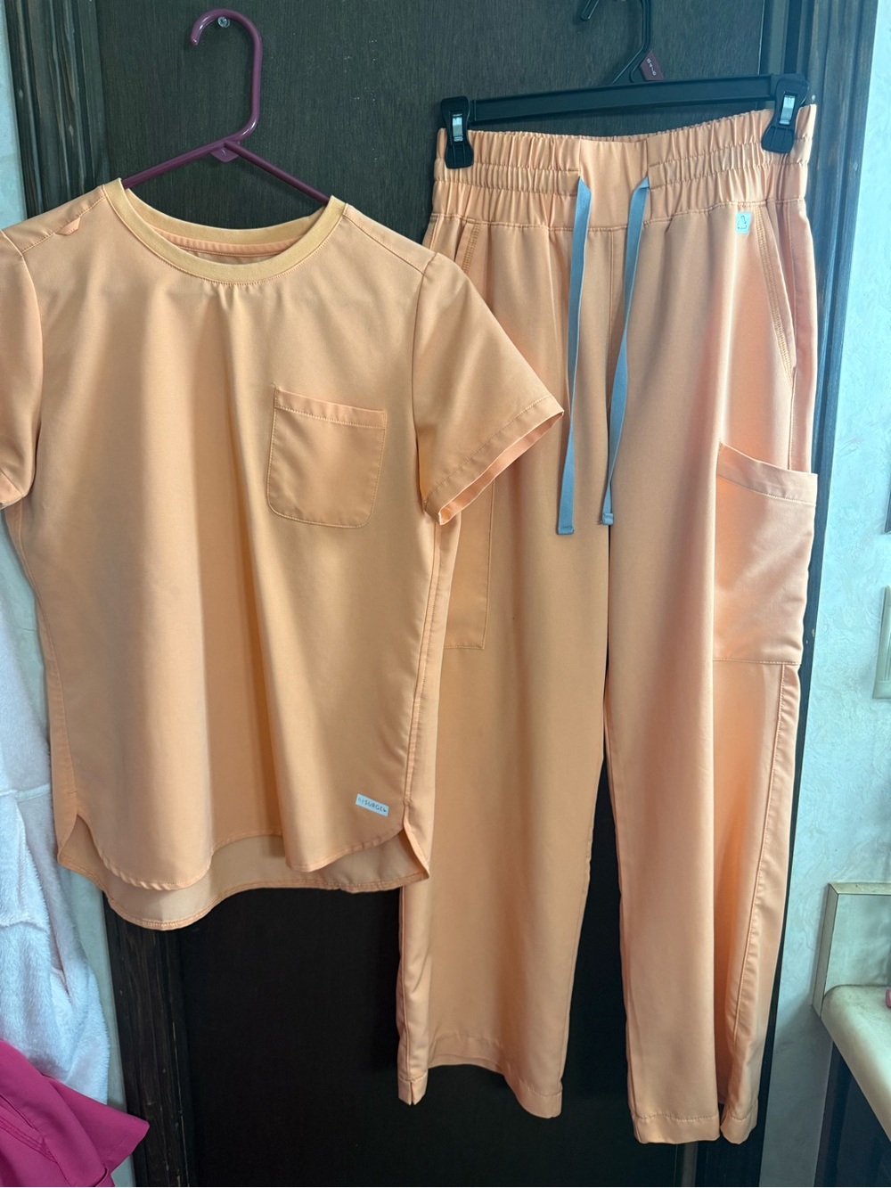 Resurge scrubs with comfy t shirt style top and high waisted wide leg bottoms